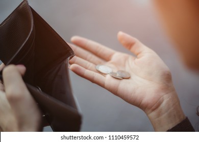 businesswoman on have money unemployed and bankrupt looks into his empty wallet. Stress crisis, unemployed businessmen are waiting for new jobs, recession situation and hopelessness crisis concept. - Shutterstock ID 1110459572