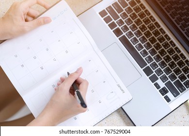 Businesswoman Planning Agenda And Schedule Using Calendar Event Planner. Woman Hands Writing Plan For Working And Schedule This Month. Planner Of Meeting Plan Job. 