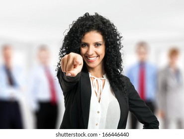 Businesswoman Pointing Her Finger At You