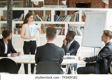 Businesswoman presenting startup design project to investors, manager designer shows clients statistics report and color swatches palette, giving presentation of work result at executive team meeting - Powered by Shutterstock