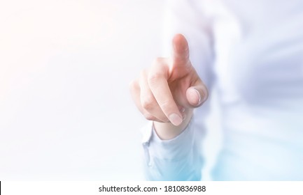 businesswoman presses on transparent touch screen. new technology - Powered by Shutterstock