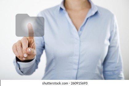 Businesswoman pressing button on the digital touch screen
