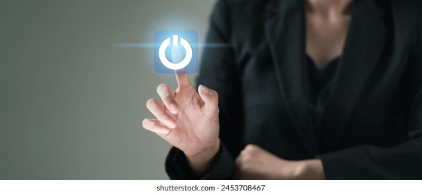 businesswoman pressing power button. Start or shut down concept.. Hand of businessman pressing power button.