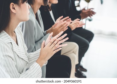 Businesswoman proficiently present work project receive celebrations from team . Corporate business team collaboration concept . - Shutterstock ID 2049360191