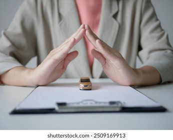 Businesswoman protects and insures cars for customers, car sales contract, car insurance and car insurance concept. - Powered by Shutterstock