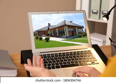 Businesswoman or real estate agent looking through online property portfolio, closeup