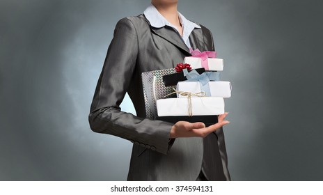 Businesswoman Receiving Or Presenting Gifts