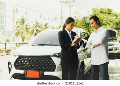 Businesswoman Representing An Auto Insurance Company Enters Into An Insurance Contract With The Owner New Car With A Red License Plate, And New Driver To Get Life Insurance For Safety While Traveling.