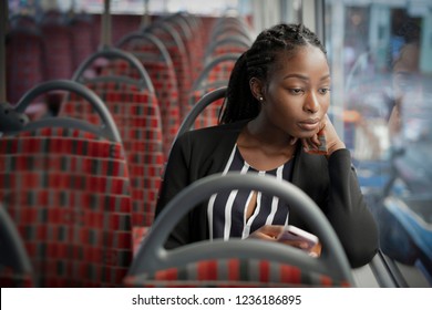 Businesswoman Riding The Bus To Work