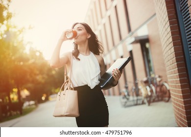 Businesswoman In A Rush To Work