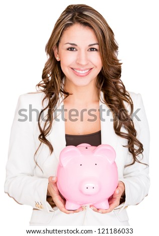 Businesswoman saving money in a piggybank - isolated over white