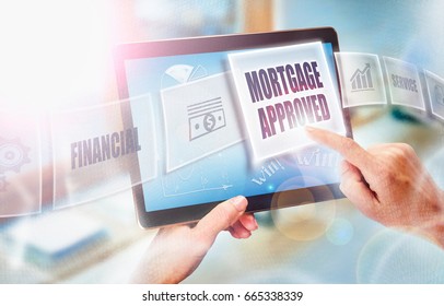 A businesswoman selecting a Mortgage Approved business concept on a futuristic portable computer screen.