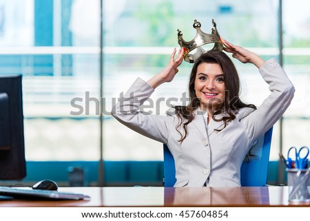 Businesswoman sitting at the office desk