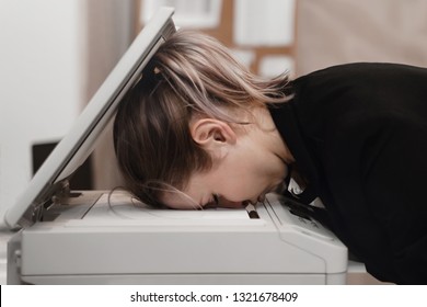 Businesswoman sleeping on printer at office. Overworked concept.