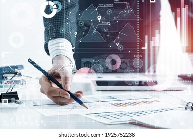 Businesswoman Standing Near Office Desk And Analyzing Financial Charts. Successful Corporate Manager In Business Suit. Close-up Woman Hand With Pen. Entrepreneurship Double Exposure Concept.