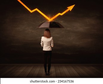 Businesswoman standing with umbrella keeping orange arrow concept on background - Powered by Shutterstock