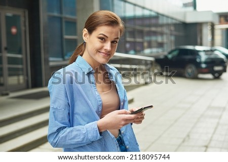 Similar – beautiful woman talking on the phone while laughing.