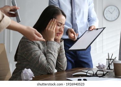 Businesswoman stressing out at workplace in office