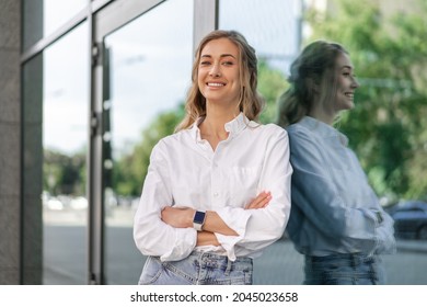 Businesswoman Successful Woman Smiling Business Person Standing Outdoor Corporate Building Exterior Happy Caucasian Confidence Professional Business Woman Middle Age Female White Shirt Big Window Lean - Powered by Shutterstock