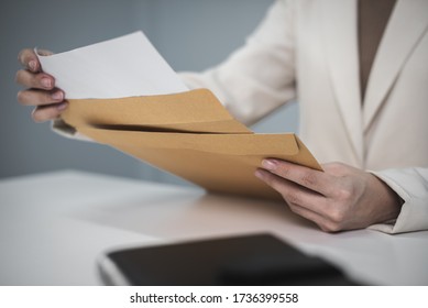 Businesswoman in suite working with documentary data on white desk at office, Business accounting and financial concept - Shutterstock ID 1736399558