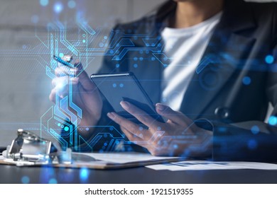 Businesswoman taking notes using smart-phone. Technology drawings double exposure. - Shutterstock ID 1921519355
