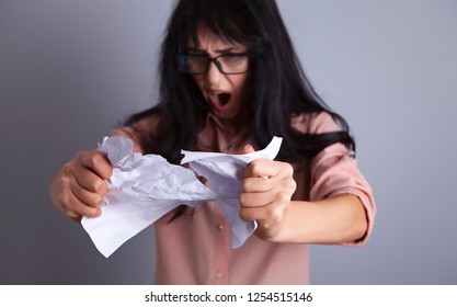 businesswoman tear paper angry screaming - Shutterstock ID 1254515146