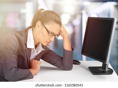Businesswoman tired of computer work