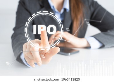 Businesswoman Touch IPO Icon On Digital Virtual Trading Screen. Stock Market. Business Finance And Technology Concept.