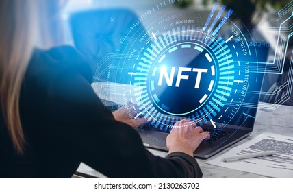 Businesswoman typing on laptop keyboard. Non-fungible token hologram hud on screen, binary code and metaverse. NFT and virtual art. Concept of cryptoart