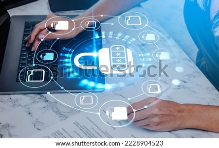 Businesswoman typing on laptop, sign a contract. Glowing lock hud hologram with hidden password. Concept of data security and agreement