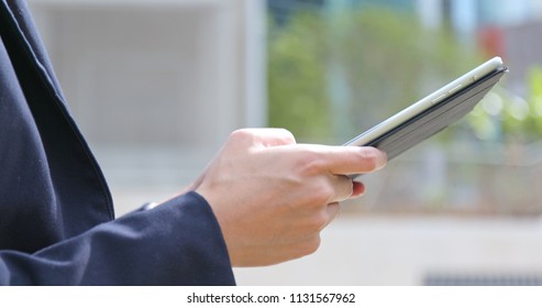 Businesswoman use of tablet computer  - Shutterstock ID 1131567962