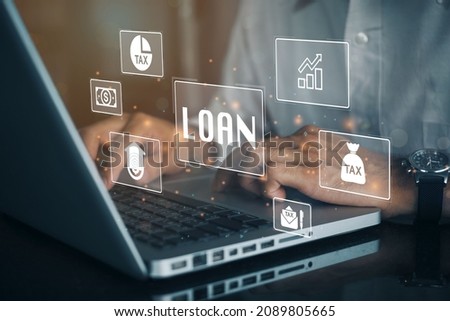 Businesswoman using a computer to LOAN icons over the Network connection. Non performing loans. Businessman pressing a Business Loan concept button.
