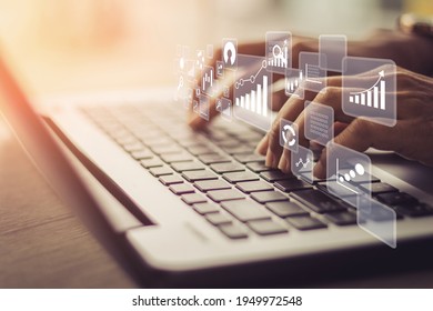 Businesswoman using laptop in data management.