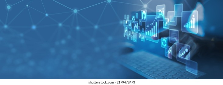 Businesswoman using laptop in data management.