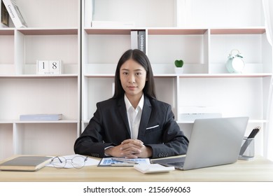 Businesswoman Using Laptop To Work, Asian Woman Working In The Office, World Of Technology And Internet Communication, Using Computers To Conduct Financial Transactions Because The Convenience.