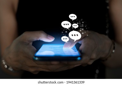 Businesswoman using smart phone,Social media concept - Shutterstock ID 1941361339