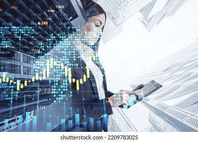 Businesswoman Using Tablet With Creative Forex Chart With Candlestick Graph, Index And Tech Hologram On Blurry White Daylight Toning City Background. Trade, Success, Ceo, Executive, Stock, And Finance