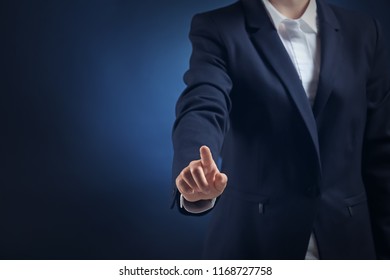 Businesswoman using virtual screen on color background - Powered by Shutterstock