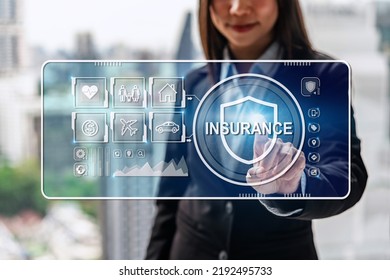 Businesswoman With Virtual Screen Of  Insurance Protection For House, Car, Life, Family, Travel And Health, Insurance Concept