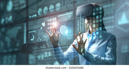 Businesswoman in vr glasses touching graphs on a virtual screen with HUD interface. Internet of things and futuristic technologies concept. Mixed media.
 - Powered by Shutterstock