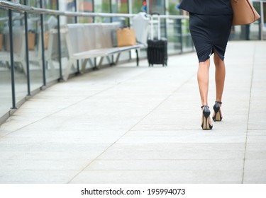 Businesswoman Walking Away Low Angle Cross Section