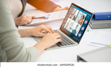 Businesswoman Watching Laptop Webinar Video Course At Home Office.Happy Woman Student Listening Lecture Study Online Protection Covid-19.Webinar E-business,e Learning And Seminar Online Concept.