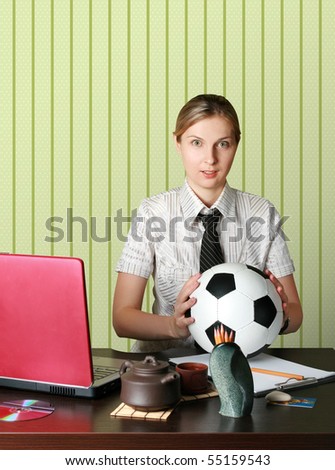 businesswoman watching soccer competitions with ball