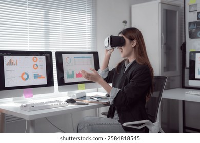 Businesswoman wearing virtual reality headset is analyzing financial data in metaverse, interacting with charts and graphs projected in virtual space