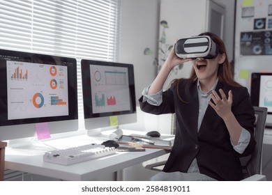 Businesswoman wearing a VR headset immerses in virtual reality for financial data analysis within a modern office, showcasing innovative technology transforming business practices - Powered by Shutterstock - Get 15% off with code: PIKWIZARD15