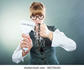 Businesswoman woman ending agreement deal. Young girl holding chain breaking free creasing squeezing paper. Termination, breach of contract.
