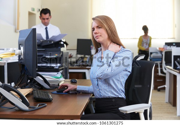 Businesswoman Working Desk Suffering Neck Pain Royalty Free