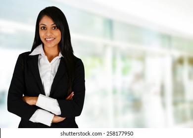 Businesswoman working at her office by herself