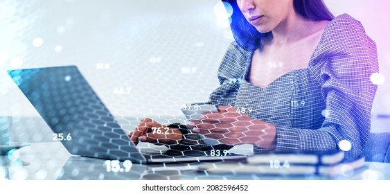 Businesswoman working with laptop and smartphone, cryptocurrency hologram with cells and chains, numbers, bokeh lights. Concept of e-business