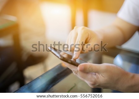 businesswoman working with modern devices, student girl using digital tablet computer and mobile smart phone,business concept,selective focus,vintage color
